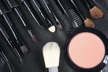 Wall Mural - Professional makeup tools. Makeup tools brushes, powder and lipstic. Top view. Flat lay. Selective focus