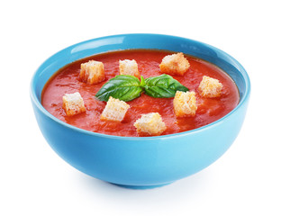 Canvas Print - Bowl of tomato soup with croutons isolated on a white background.