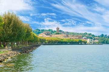 Wall Mural - Marta (Italy) - A little medieval town on Bolsena lake with suggestive sidewalk and water front; province of Viterbo, Lazio region