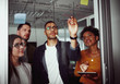 © StratfordProductions - Group of casual business people planning and writing over the project on glass window at modern office