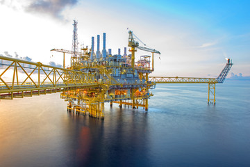 Offshore oil and gas rig platform with beautiful sky in the gulf of Thailand.