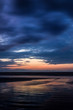 © Vernaglia - Mar, praia e nuvens ao amanhecer. Litoral de São Paulo, Brasil