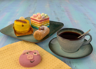 Wall Mural - Beautiful and delicious cakes.Black coffee.On light background