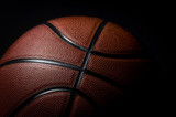 Fototapeta Sport - Closeup detail of basketball ball texture background