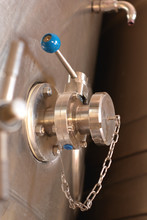 Food Grade Stainless Steel Butterfly Valve On A Wine Tank With A Standard DIN Sanitary End Cap