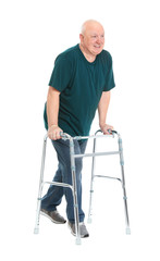 Canvas Print - Elderly man with walking frame on white background. Medical help