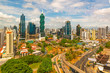 © SL-Photography - The cityscape of Panama city with its most famous skyscrapers in the financial district at sunrise with the morning traffic on the highway, Panama, Central America.