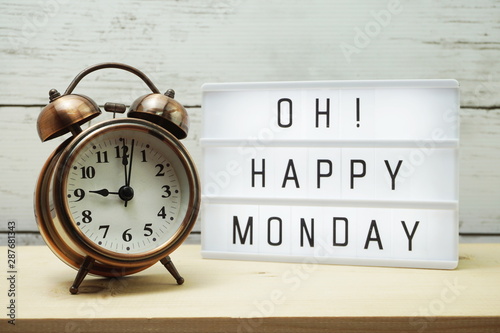 Fotomural Happy Monday lightbox alphabet wording on wooden background