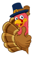 Wall Mural - Pilgrim Turkey Thanksgiving bird animal cartoon character wearing a pilgrims hat. Peeking around a background sign and giving a thumbs up