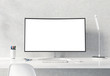 © sdecoret - Curved monitor on white desktop concrete interior mockup 3D rendering