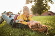 © natalialeb - mom with dreadlocks hipster and toddler walk