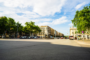 Wall Mural - Barcelona, Spain – 2019. Blurred photo of people crossing the street on a busy afternoon in downtown Barcelona.