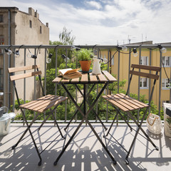 Canvas Print - Balcony with wooden furniture