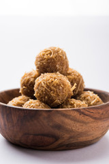 Jaggery coconut Laddoo / Nariyal gur ke laddu, indian sweet food for festivals like rakshabandhan/rakhi pournima