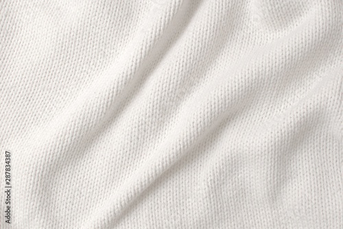 Fotografía White, thick woollen sweater. Texture detail.