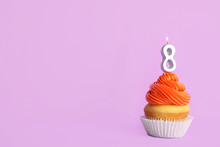 Birthday Cupcake With Number Eight Candle On Violet Background, Space For Text