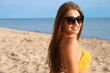 © New Africa - Beautiful young woman in bikini on beach
