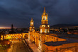 Cityscape of Arequipa after sunset with the illuminated Cathedral and the Plaza de Armas main square, Peru.