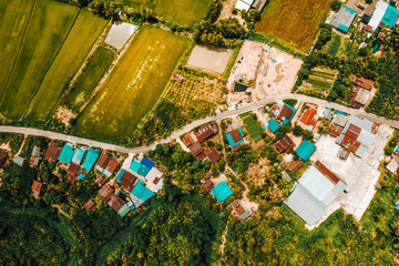 aerial view from drone of road and rural area with a fields