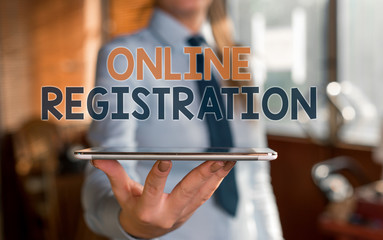 Leinwandbilder - Writing note showing Online Registration. Business concept for System for subscribing or registering via the Internet Blurred woman in the background pointing with finger in empty space