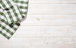 © missty - Kitchen towel on empty wooden table. Napkin close up top view mock up for design. Kitchen rustic background.
