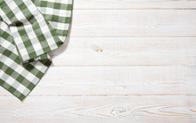 Kitchen Towel On Empty Wooden Table. Napkin Close Up Top View Mock Up For Design. Kitchen Rustic Background.