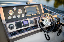 Instrument Panel And Steering Wheel Of A Motor Boat Cockpit