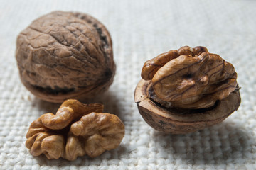 Wall Mural - Walnuts on the burlap texture