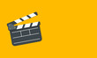 Open clapperboard isolated on yellow background. Vector illustration