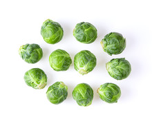 Group Of Brussel Sprouts Isolated On White Background. Top View