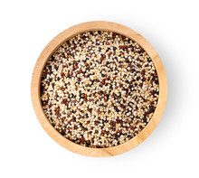 Pile Of Mixed Raw Quinoa In Wood Bowl Isolated On White Background. Top View