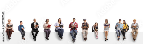 Fotomural Old and young people sitting on a banner reading books