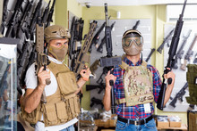 Male Customers Try On Ammunition With Weapon