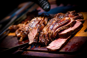 Cut ancho steak. Ancho steak on the board. BBQ Medium Rare ancho Steak.