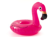 Beach Relaxation, The Fun And Joy Of Learning To Swim And Happy Summer Conceptual Idea With Inflatable Pink Lifebuoy In The Shape Of A Flamingo Isolated On White Background With Clipping Path Cutout