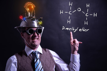 Wall Mural - Nerd presenting handdrawn chemical formula of Dimethyl ether methoxymethane DME