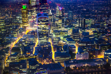 Wall Mural - City of London business and banking area at nigh with beautiful lit up skyscrapers and streets. London, UK