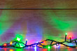 Fairy lights against a grey wooden background