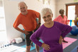 © WavebreakMediaMicro - Front view of senior couple exercising in fitness studio