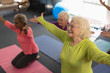 © WavebreakMediaMicro - Senior people exercising in fitness studio