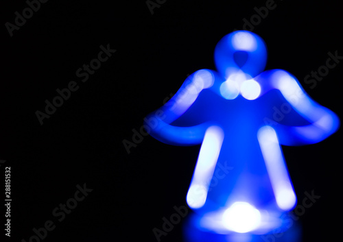 Blue Christmas Angel Light Silhouette Isolated On Black Background With Copy Space Christmas Lights And Decoration Background For Cards And Ads Buy This Stock Photo And Explore Similar Images At Adobe
