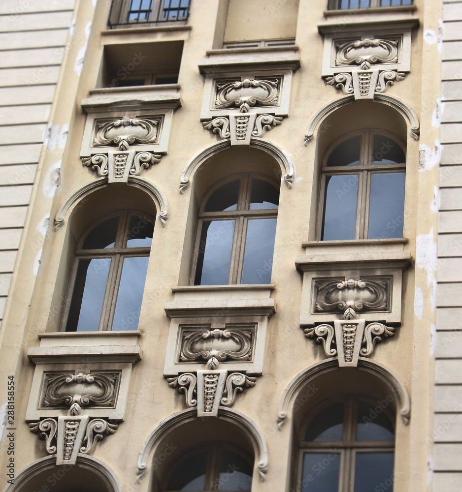 Architectural building with three diagonal rows of windows on different ...