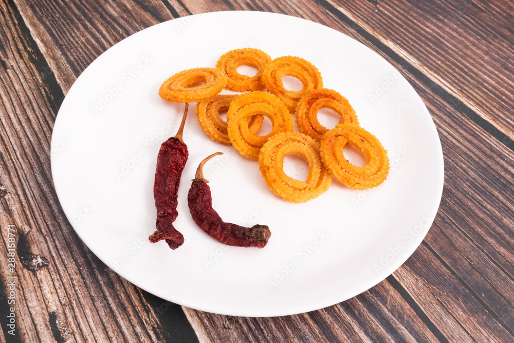 Indian Snack Chakli, a spiral crisp fried snack, It is known as Chakali ...