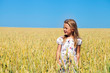 © Andrey_Arkusha - Little girl in a wheat golden field