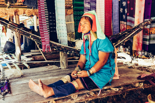 Plakat Long Neck Woman wearing at traditional costume. Tribal village Thailand.