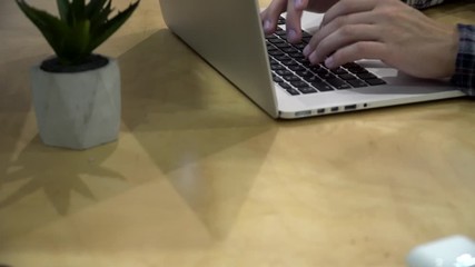 Poster - working on laptop computer. freelancer's hands typing on laptop keyboard text. business concept.hand