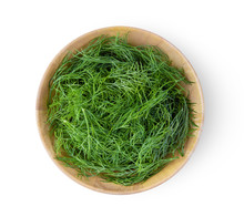 Fresh Dill In Wood Bowl Isolated On White Background. Top View