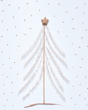 Christmas Composition Of Dry Twigs, Leaves And Paper Stars In The Shape Of A Christmas Tree On A Gray Background. Flat Lay