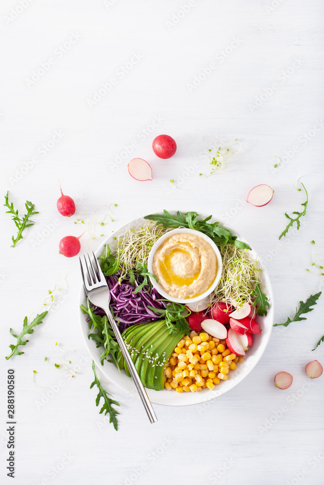 vegan avocado sweet corn lunch bowl with hummus, red cabbage, radish and sprouts - obrazy, fototapety, plakaty 