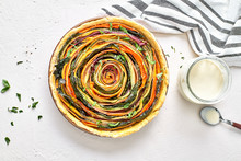 Stock Photo Of A Vegan Organic Vegetable Spiral Tart And Cashew